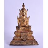 A 19TH CENTURY SOUTH EAST ASIAN GILT BRONZE FIGURE OF A BUDDHA modelled upon a triangular base. 19.5