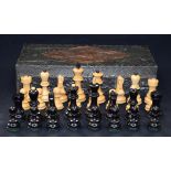 A CASED ANTIQUE CHESS, set contained in a box set with copper panel depicting a bird. King height 10