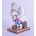 A GOOD RUSSIAN GARDNER FACTORY PORCELAIN FIGURE OF A BAST SHOE MAKER modelled upon a brown painted