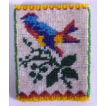 A LATE VICTORIAN BEAD WORK CARD CASE decorated in the North American style with a stylised bird upon