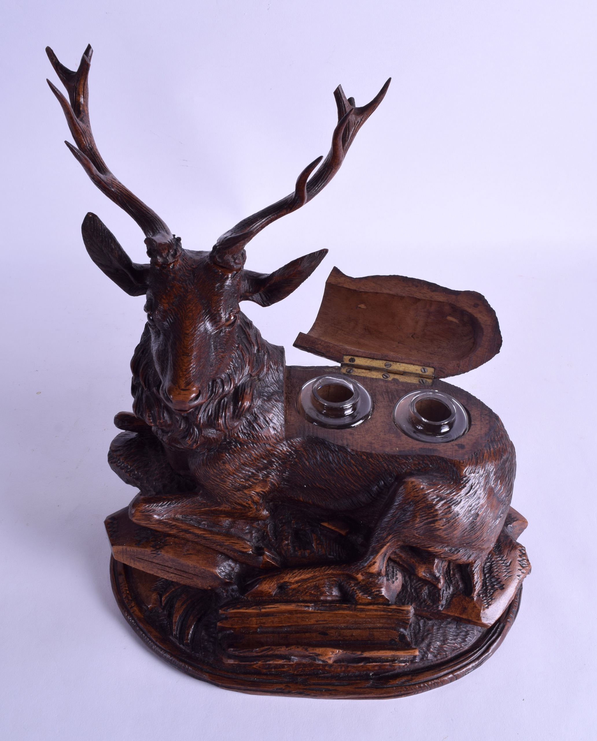 A FINE 19TH CENTURY BAVARIAN BLACK FOREST CARVED WOOD INKWELL in the form of a seated stag upon a - Image 3 of 3