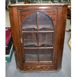 A LARGE VICTORIAN MAHOGANY CORNER CABINET, with brass swan neck handles.112 cm x 83 cm.