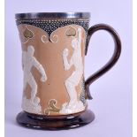 A GOOD 19TH CENTURY ROYAL DOULTON STONEWARE MUG with silver mounts, depicting figures in various
