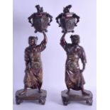 A GOOD PAIR OF 19TH CENTURY JAPANESE MEIJI PERIOD BRONZE VASES AND COVERS in the manner of Miyao,