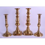 TWO PAIRS OF ANTIQUE BRASS CANDLESTICKS. 29 cm & 25.5 cm high. (2)