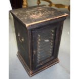 AN ANTIQUE WOODEN SPECIMEN COIN CABINET, painted black.