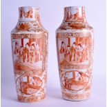 A PAIR OF MID 19TH CENTURY CHINESE PORCELAIN CANTON VASES painted with figures within interiors.