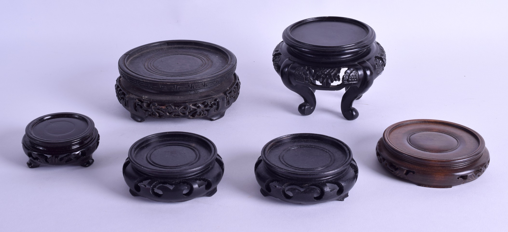 A GROUP OF SIX EARLY 20TH CENTURY CHINESE CARVED HARDWOOD STANDS. (6) - Image 2 of 2