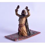 AN AUSTRIAN COLD PAINTED BRONZE FIGURE OF AN ARABIC MALE in the manner of Bergmann, modelled upon