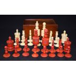 A GOOD BOXED GEORGIAN CHESS SET, with well carved bone pieces. King height 10 cm.