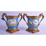 A GOOD PAIR OF 18TH CENTURY SEVRES BLUE GROUND CACHE POTS with lovely antique French ormolu
