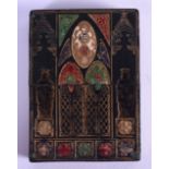 A RARE REGENCY GREEN LEATHER CARD CASE highlighted in gilt and red leather with saints and motifs. 7