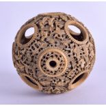 A VERY LARGE 19TH CENTURY CHINESE CANTON CARVED IVORY PUZZLE BALL carved with figures, landscapes in