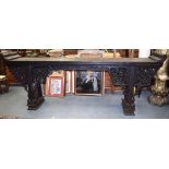 A HUGE QING DYNASTY CARVED HARDWOOD LACQUERED ALTAR TABLE, with carved foliate frieze. 115 cm x