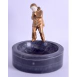 A STYLISH FRENCH ART NOUVEAU BRONZE AND IVORY INKWELL modelled as a male clutching his hands