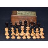 A BOXED CHESS SET, "The Club Box, of Wood Chessmen". King height 7.2 cm.