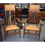 A STYLISH MATCHED PAIR SECESSIONIST MOVEMENT ARM CHAIR, mahogany with satinwood inlay. 120 cm high.