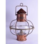 A STYLISH ANTIQUE COPPER AND BRASS SHIPS CABIN LAMP by Hugh Douglas. 44 cm high.