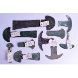 A COLLECTION OF VERY EARLY MIDDLE TO EARLY AGE BRONZE TOOLS in various forms and sizes. Largest 34