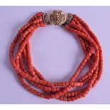 AN 18CT GOLD MOUNTED CARVED RED CORAL NECKLACE. 100 grams. 30 cm long.