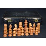 A VINTAGE LEATHER CASED CHESS SET. King height 8 cm.