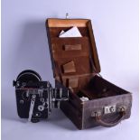 A GOOD 1960S PAILLARD BOLEX CASED KERN PAILLARD CAMERA 16mm, with various other fittings.