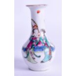 A LATE 19TH CENTURY CHINESE FAMILLE ROSE PORCELAIN VASE painted with figures within landscapes. 8.