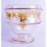 A LATE 19TH CENTURY BOHEMIAN GILT OVERLAID CLEAR GLASS BOWL decorated all over with vine leaves