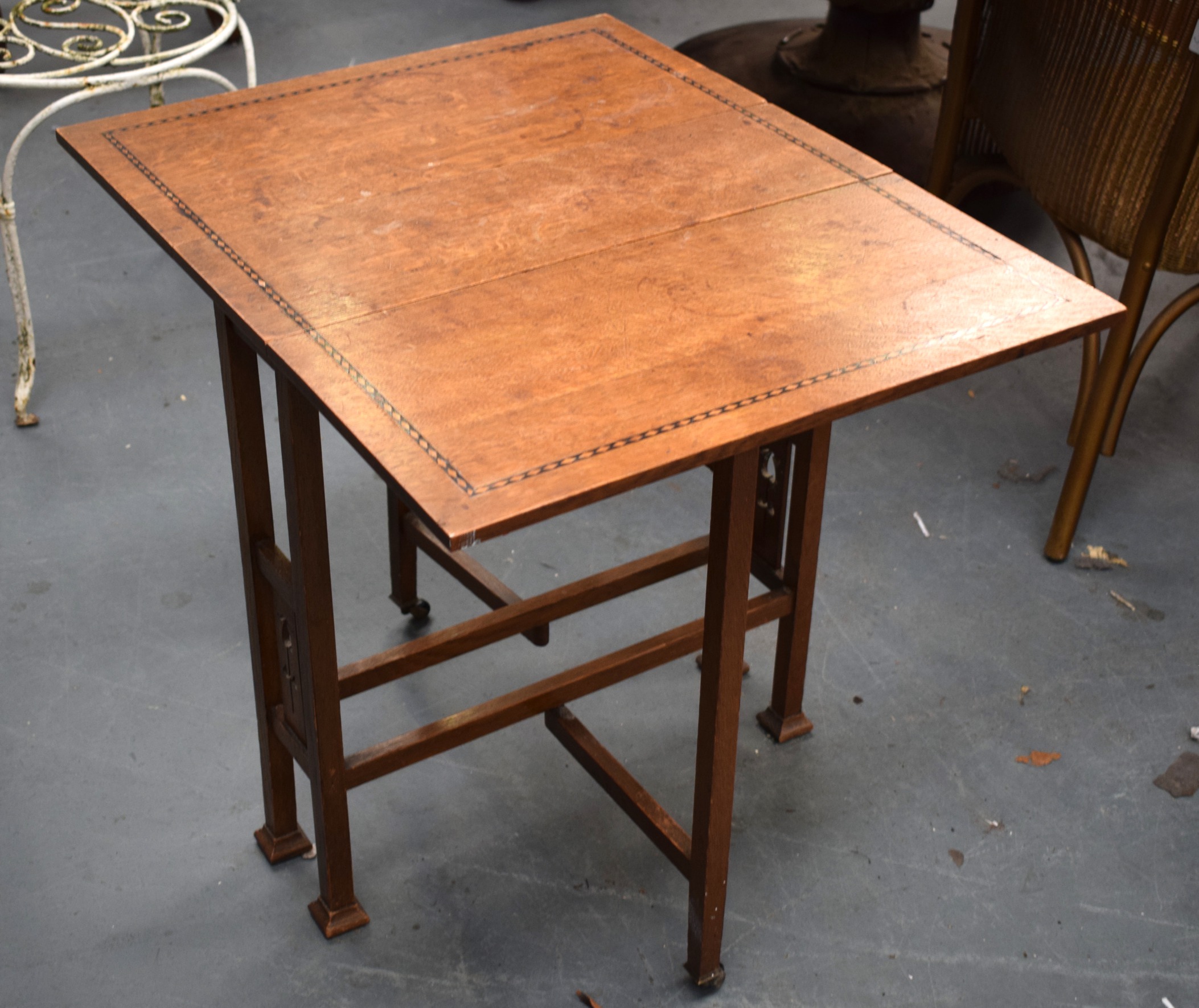 A MAHOGANY OCCASIONAL TABLE, with inlaid border. 61 cm x 70 cm.