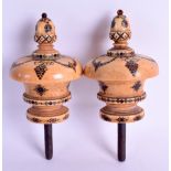 A FINE RARE PAIR OF 18TH CENTURY CARVED IVORY PIQUE WORK CURTAIN PULLS or possibly Scroll Ends,