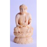 A GOOD 19TH CENTURY JAPANESE MEIJI PERIOD CARVED IVORY OKIMONO modelled as a seated buddha upon a