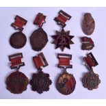 A COLLECTION OF NINE CHINESE REPUBLICAN PERIOD COPPER AND ENAMEL MEDALS in various forms and