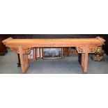 A CHINESE HARDWOOD ALTAR TABLE, with carved frieze. 86 cm x 250 cm.