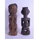 TWO EARLY 20TH CENTURY AFRICAN TRIBAL FERTILITY FIGURES. 28 cm & 30 cm long. (2)