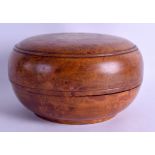 AN EARLY 20TH CENTURY ENGLISH CARVED BURR WALNUT BOX AND COVER with figured top. 22 cm diameter.