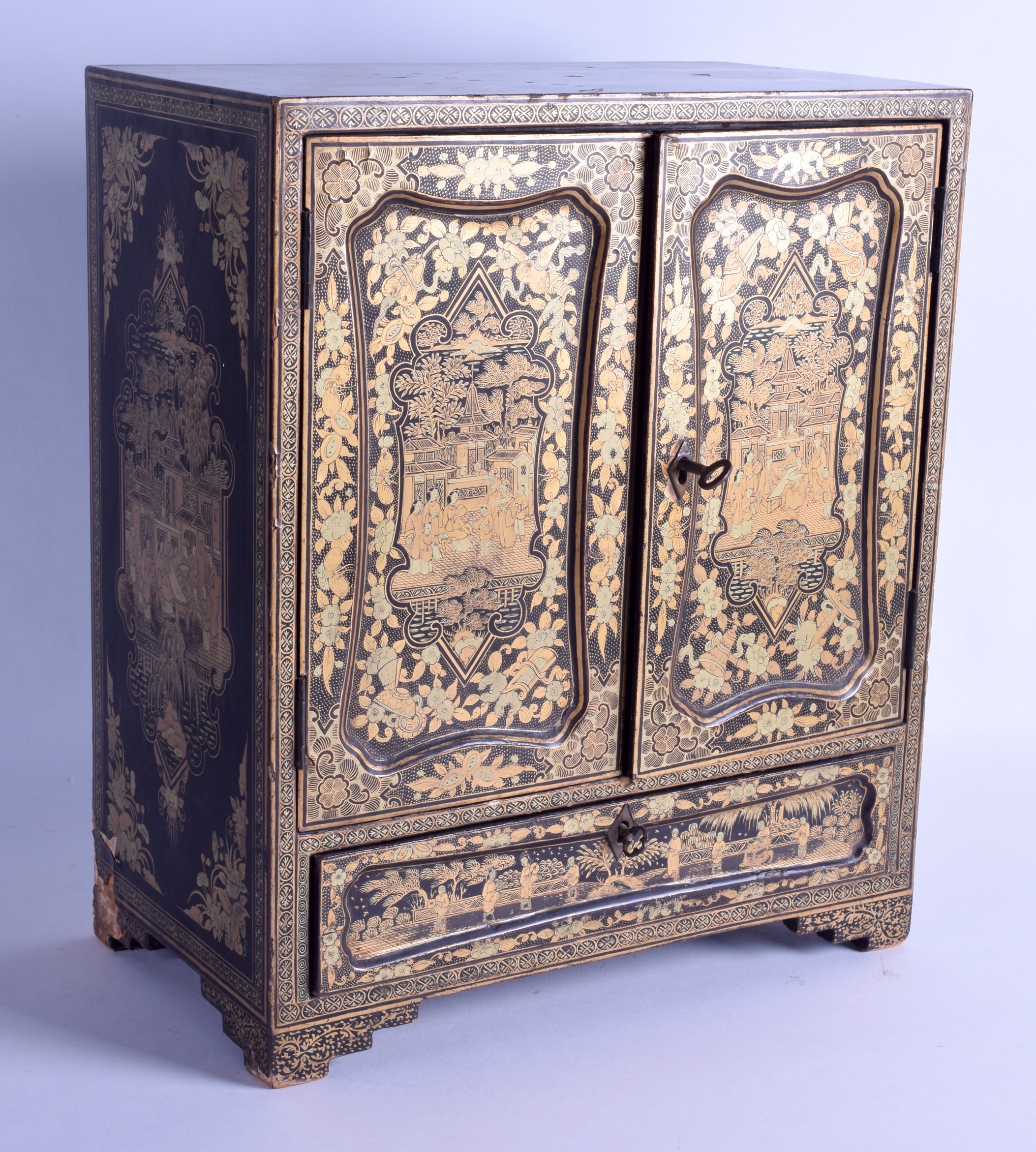 A MID 19TH CENTURY CHINESE EXPORT BLACK LACQUER TABLE CABINET with two doors over a pull out drawer,