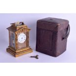 A FINE LARGE 19TH CENTURY FRENCH BRONZE REPEATER CARRIAGE CLOCK with arched pediment, decorated with