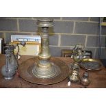 A GOOD ANTIQUE EASTERN ALTAR STICK together with a copper charger etc/