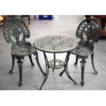 A PAINTED GREEN METAL GARDEN TABLE, together with a pair of chairs. (3)