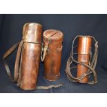 THREE ANTIQUE TELESCOPE CASES, in English chestnut leather. (3)