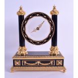 A 1980S FRANKLIN MINT FABERGE LIMITED EDITION MYSTERY CLOCK with twin side columns, overlaid with