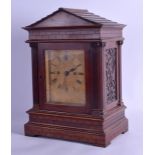 A VICTORIAN CARVED MAHOGANY MANTEL CLOCK by Webster of London, within a case capped with acanthus