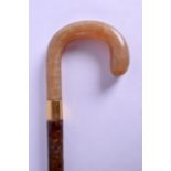 LATE 19TH CENTURY CARVED RHINOCEROS HORN WALKING CANE of scrolling form. 92 cm long.