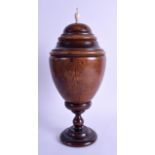 A GOOD 18TH/19TH CENTURY CARVED TREEN AND COCONUT VASE AND COVER with turned bone finial,