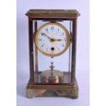 AN EARLY 20TH CENTURY FRENCH 'PENDULE 400 JOURS' FOUR GLASS REGULATOR CLOCK within an onyx case.