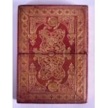 AN UNUSUAL REGENCY RED LEATHER CARD CASE decorated with extensive gilt scrolls and motifs. 7 cm x