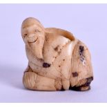 A SMALL 19TH CENTURY JAPANESE MEIJI PERIOD CARVED IVORY NETSUKE modelled as a bearded male. 3 cm x