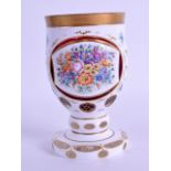 A LATE 19TH CENTURY BOHEMIAN ENAMELLED CRANBERRY GLASS BEAKER painted with extensive foliage and