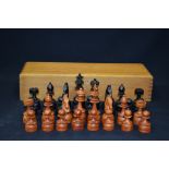 A VINTAGE BOXED CHESS SET, of plain form. King height 11 cm.