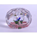 A GOOD 19TH CENTURY FACETED UPRIGHT-BOUQUET PAPERWEIGHT possibly St Louis. 7 cm wide.